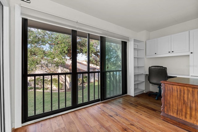 office space with light hardwood / wood-style flooring