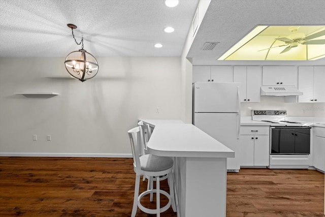 kitchen featuring custom range hood, electric range, white refrigerator, white cabinets, and hanging light fixtures