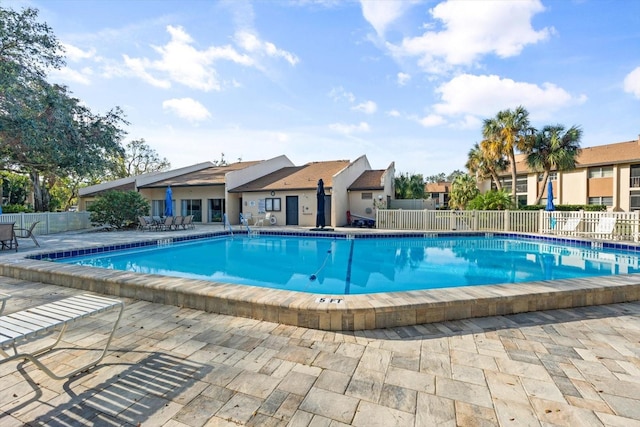 view of pool featuring a patio area