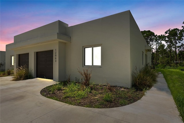 view of front of home with a garage