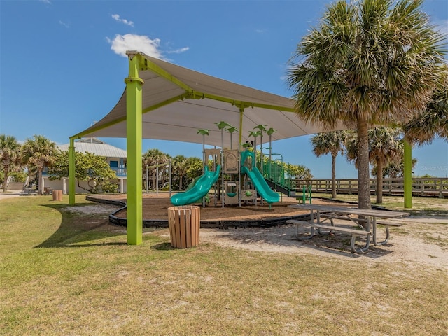 view of play area featuring a lawn