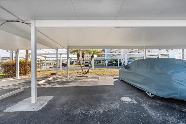 exterior space with a carport