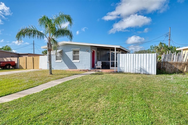 view of front of property with a front lawn