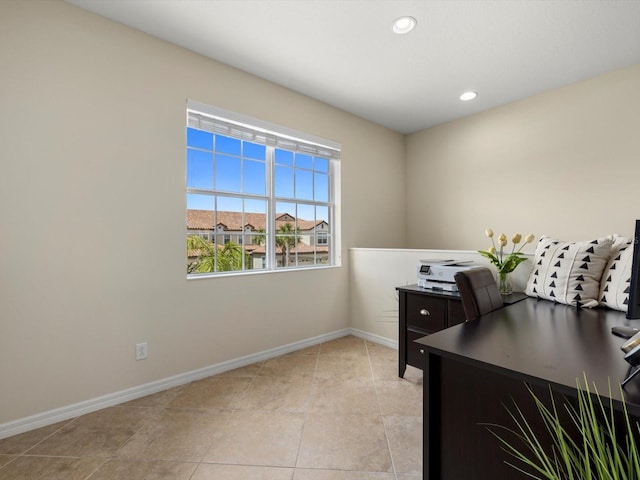 office area with light tile patterned floors