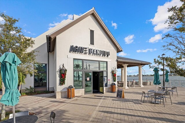 view of building exterior featuring a water view