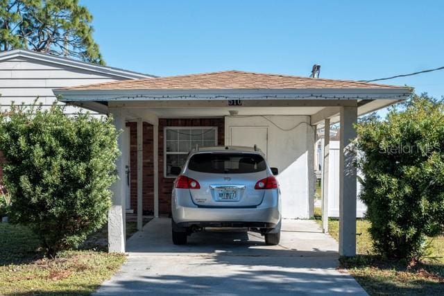 view of parking / parking lot with a carport