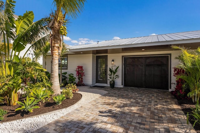 view of front of home with a garage