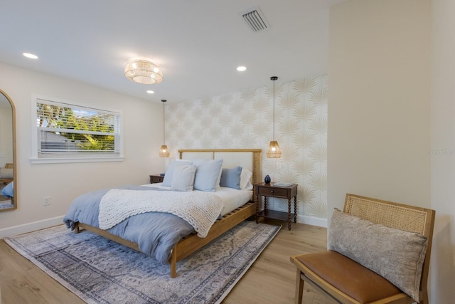 bedroom featuring light wood-type flooring