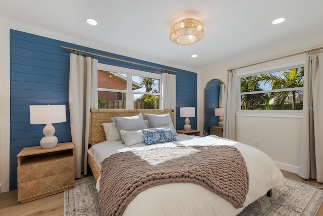 bedroom with light hardwood / wood-style flooring