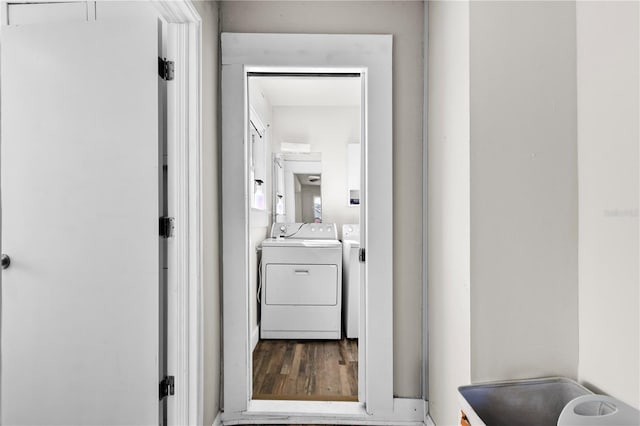 clothes washing area featuring independent washer and dryer