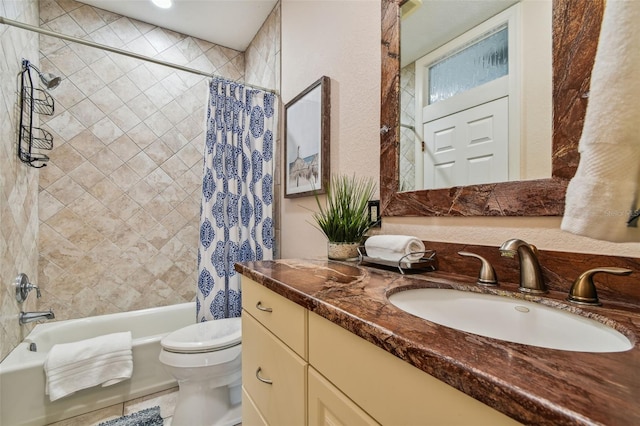 full bathroom with tile patterned flooring, vanity, toilet, and shower / bath combo