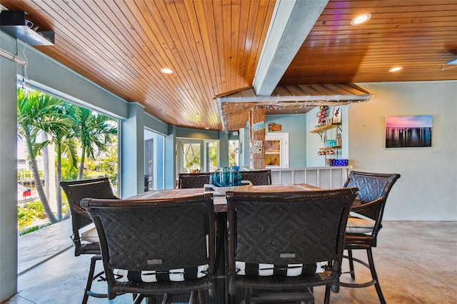 bar with beamed ceiling, wood ceiling, and french doors