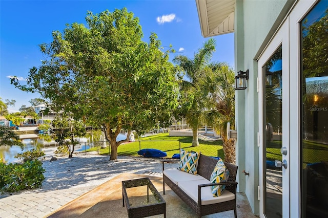 view of patio / terrace with a water view