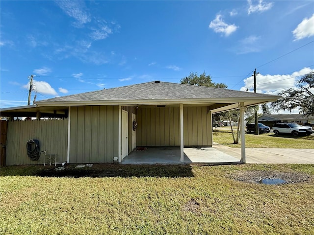 rear view of house with a yard