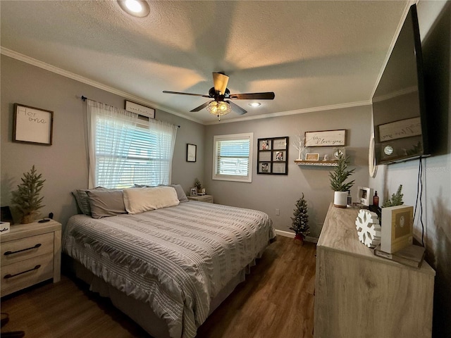 bedroom with a textured ceiling, ceiling fan, crown molding, and dark hardwood / wood-style floors