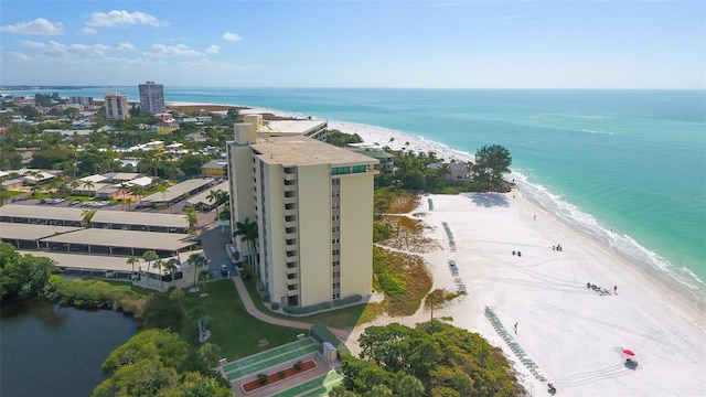 bird's eye view with a beach view and a water view