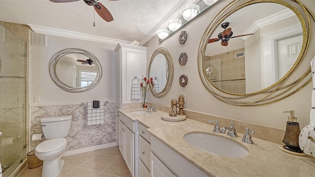 bathroom with toilet, crown molding, a textured ceiling, ceiling fan, and tile patterned flooring