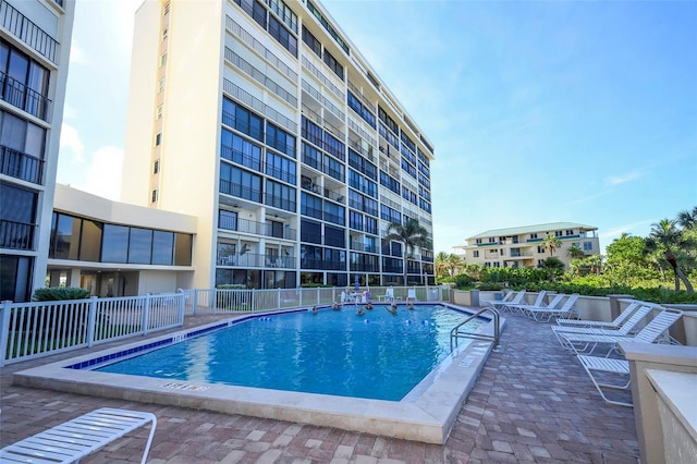 view of swimming pool with a patio area