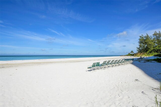 property view of water featuring a beach view