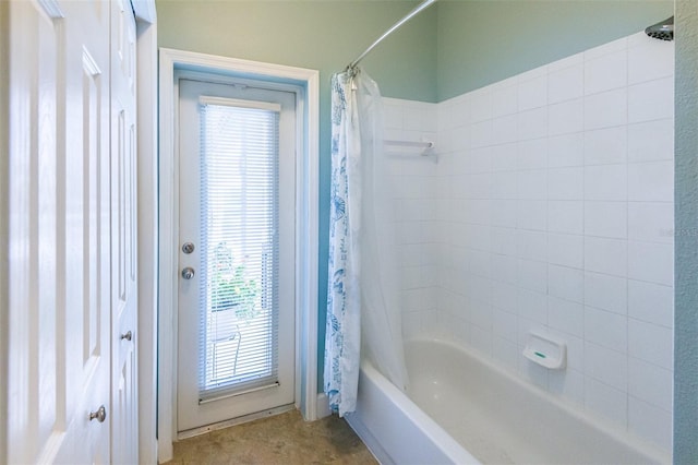 full bathroom with shower / bath combo with shower curtain