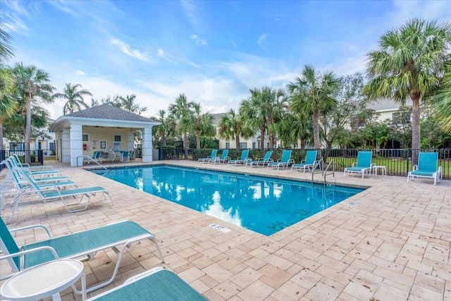 view of swimming pool featuring a patio