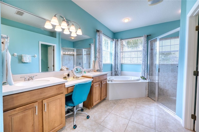 bathroom featuring tile patterned flooring, vanity, a textured ceiling, and shower with separate bathtub