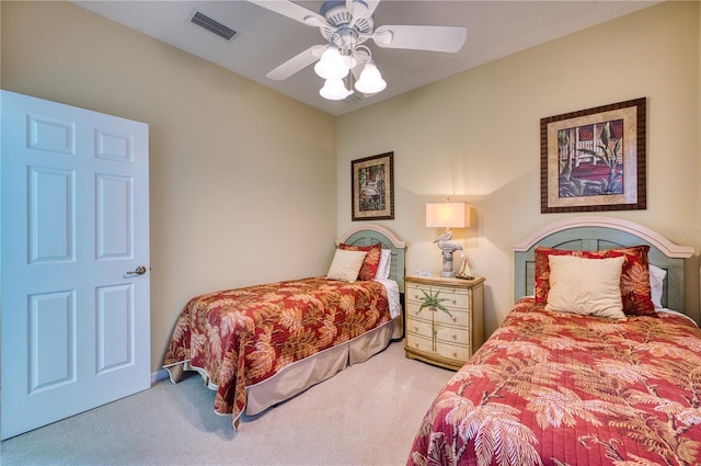 bedroom featuring ceiling fan and carpet floors