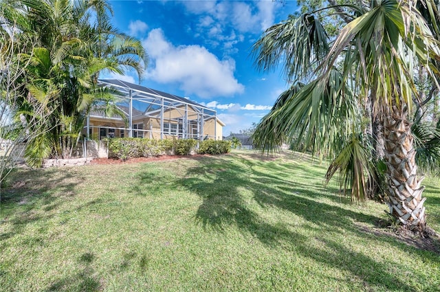 view of yard featuring a lanai