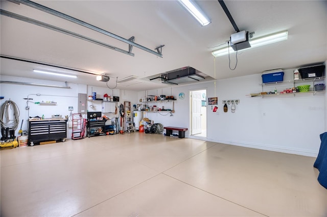 garage with electric panel and a garage door opener