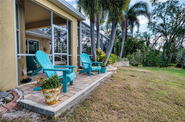 9351 Raes Creek Pl, Palmetto, FL 34221 - view of grassy yard with a patio and glass enclosure