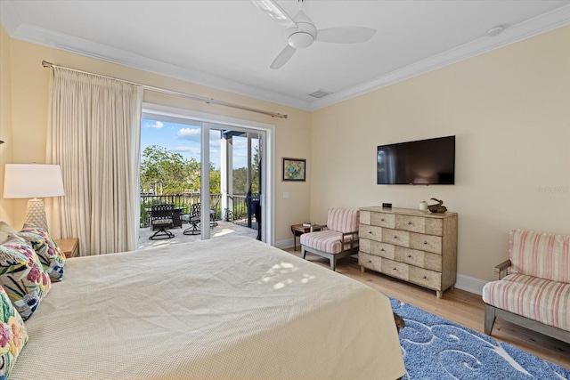 bedroom with access to outside, ceiling fan, hardwood / wood-style floors, and ornamental molding