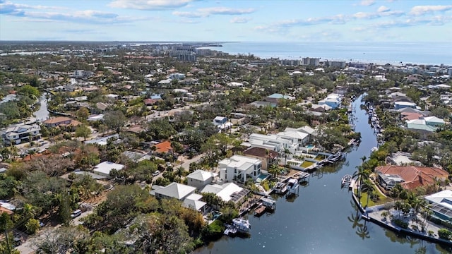 drone / aerial view with a water view