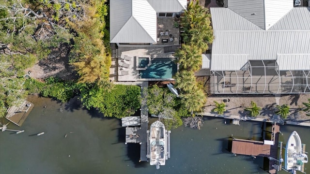 bird's eye view with a water view