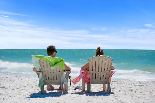 property view of water featuring a beach view