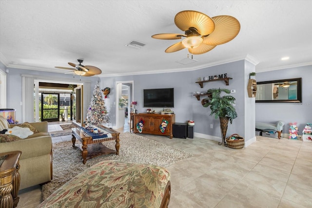 living room with ornamental molding and a textured ceiling