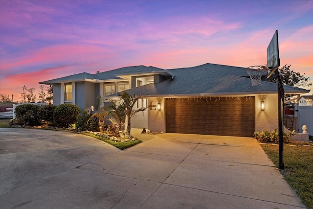 view of front of property featuring a garage