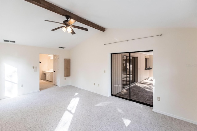 spare room featuring vaulted ceiling with beams, light colored carpet, and ceiling fan