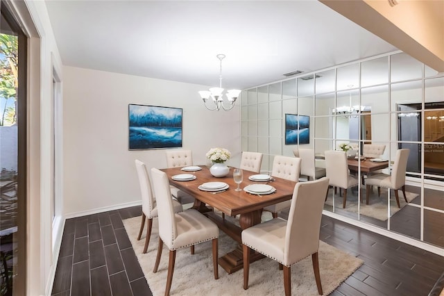 dining room featuring a notable chandelier