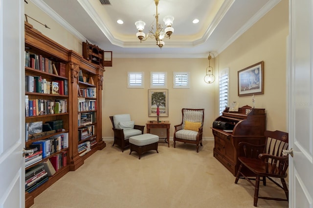 living area with light carpet, a raised ceiling, an inviting chandelier, and ornamental molding