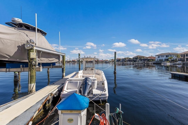 view of dock with a water view