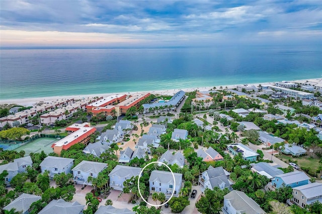 aerial view at dusk with a water view