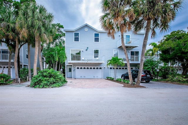 raised beach house with a garage