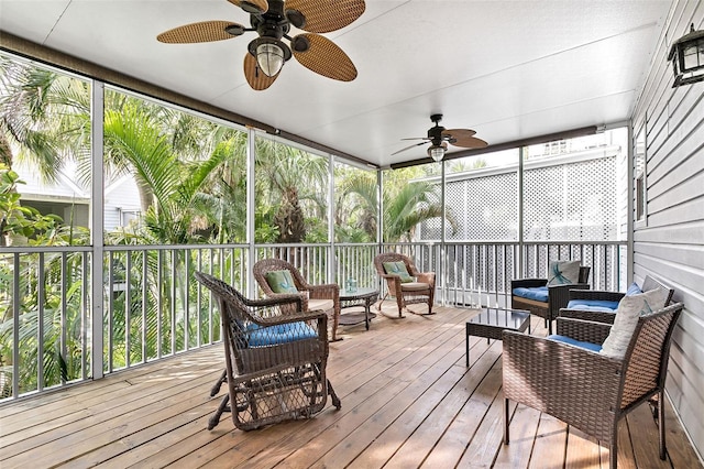 sunroom / solarium with ceiling fan