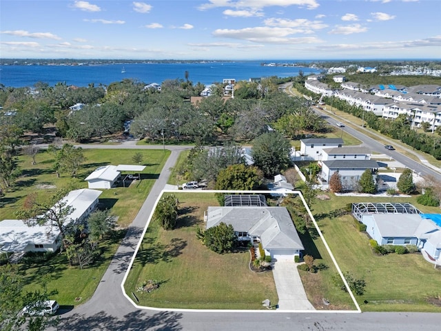 bird's eye view with a water view