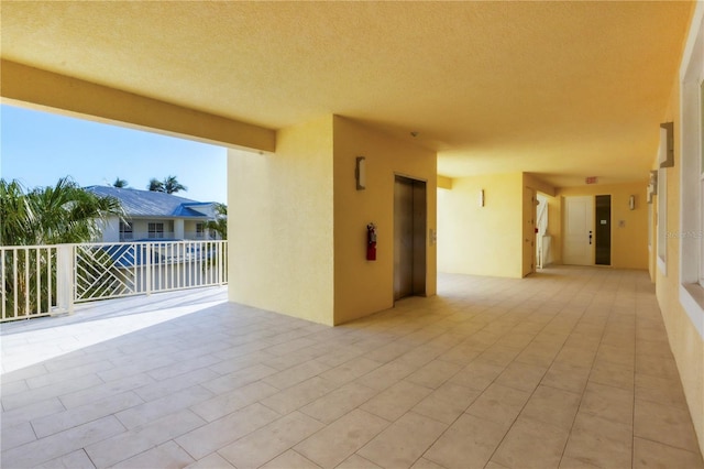 view of patio featuring elevator