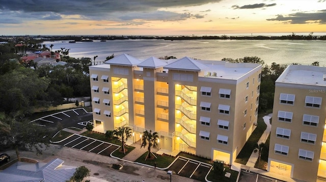 outdoor building at dusk with a water view