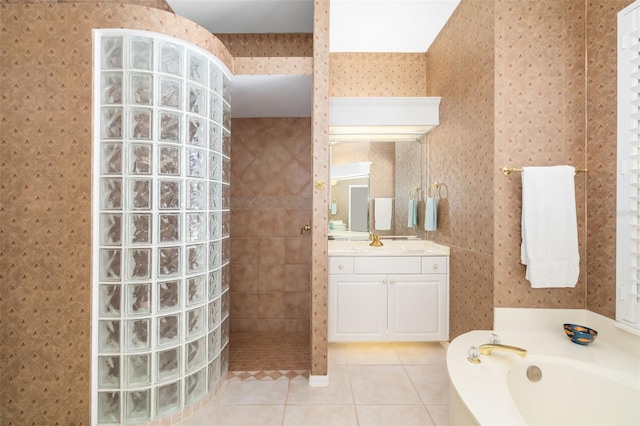 bathroom with wallpapered walls, a garden tub, a walk in shower, and tile patterned flooring