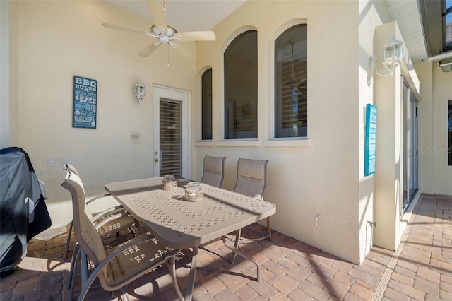 view of patio / terrace featuring ceiling fan