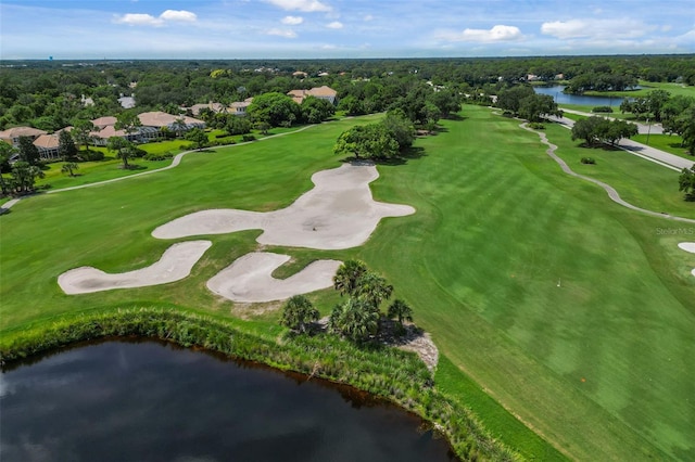 bird's eye view featuring a water view and golf course view