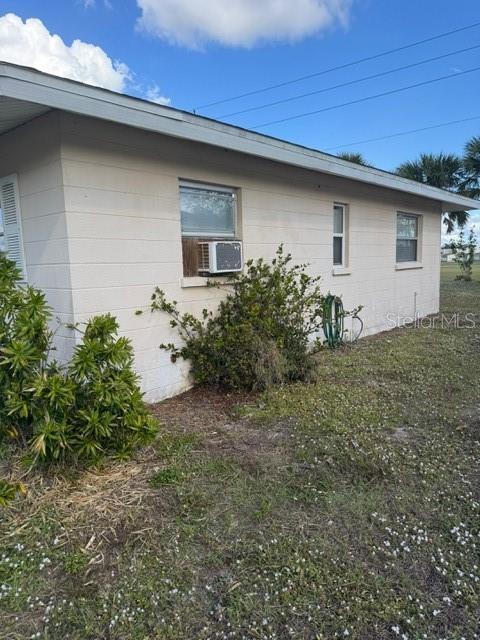 view of home's exterior featuring cooling unit